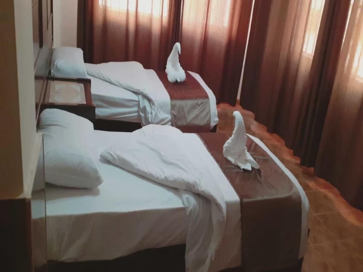 Al-Nujoom Hotel Suites Амман Экстерьер фото