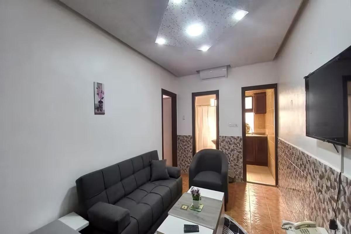 Al-Nujoom Hotel Suites Амман Экстерьер фото
