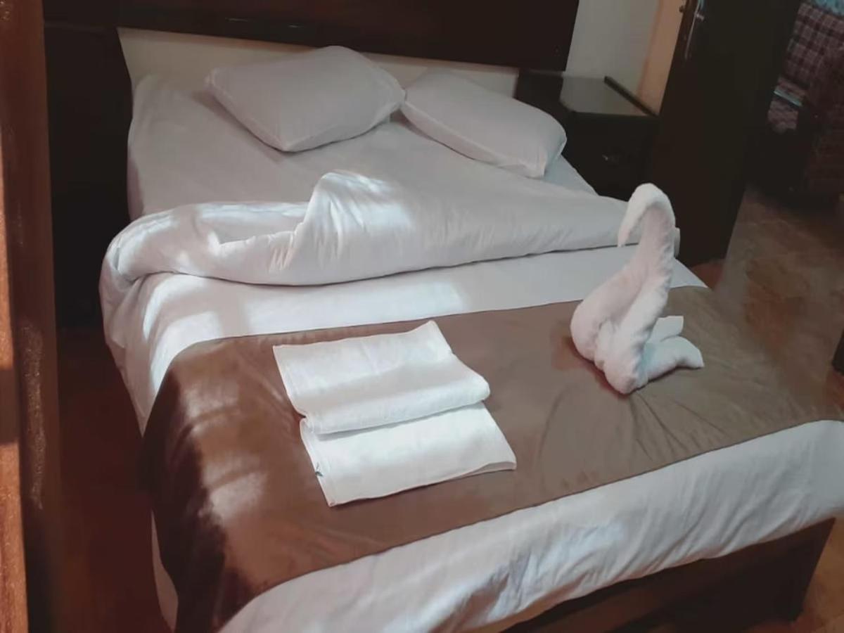 Al-Nujoom Hotel Suites Амман Экстерьер фото