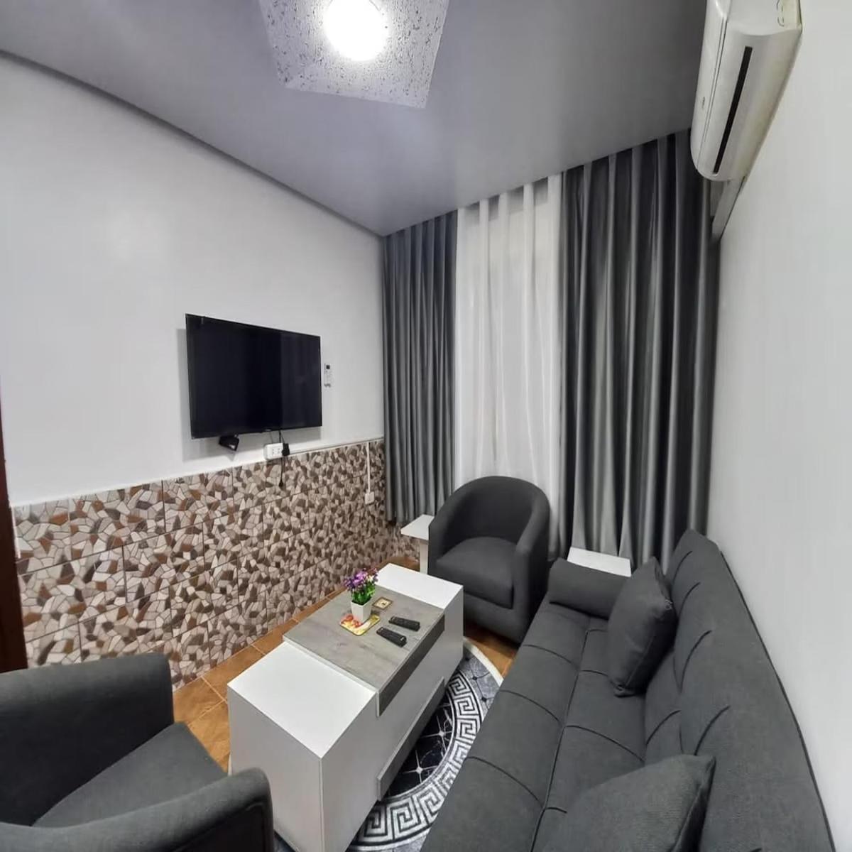 Al-Nujoom Hotel Suites Амман Экстерьер фото