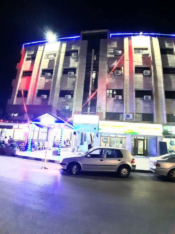 Al-Nujoom Hotel Suites Амман Экстерьер фото